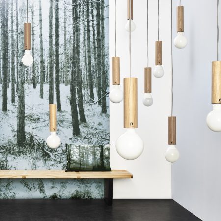 Glowing pendant lights with Forest Blue wallpaper